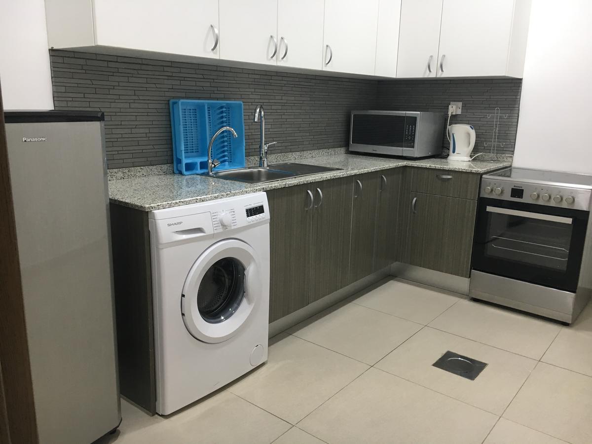 כוויית Al Muhanna Plaza Luxury Apartments מראה חיצוני תמונה